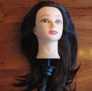 Mannequin head for hairstyles. Synthetic hair.